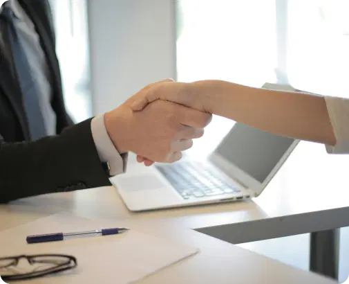 Business partnership handshake